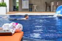 Bazén v ubytování FX Hotel Pattaya nebo v jeho okolí