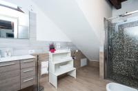 a bathroom with a shower and a sink at Villa Broglia House in Verona