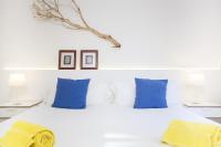 Postel nebo postele na pokoji v ubytování Villa Cala Padri