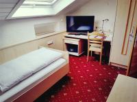 Postel nebo postele na pokoji v ubytování Hotel Spechtshaardt