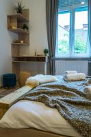 Posteľ alebo postele v izbe v ubytovaní Apartments Industrial Nordic Zagreb
