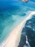 an aerial view of a beach in the ocean at Hotel Maharajah in Mamoudzou