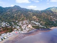 an aerial view of a village on the beach at Hotel Maharajah in Mamoudzou
