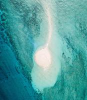 an aerial view of an island in the ocean at Hotel Maharajah in Mamoudzou