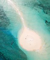 an aerial view of an island in the ocean at Hotel Maharajah in Mamoudzou