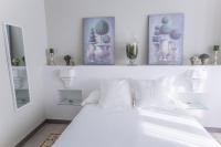 Postel nebo postele na pokoji v ubytování Gr Suites Boutique Alcazaba