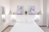 Postel nebo postele na pokoji v ubytování Gr Suites Boutique Alcazaba