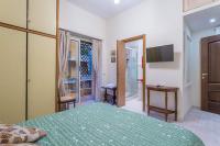A bed or beds in a room at Valla18 Guesthouse