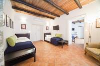 Posteľ alebo postele v izbe v ubytovaní Palazzo Marigliano - Rooms & Suites