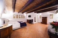Posteľ alebo postele v izbe v ubytovaní Palazzo Marigliano - Rooms & Suites