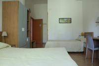 Łóżko lub łóżka w pokoju w obiekcie Verdeblu Country Hotel
