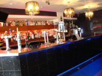 El lounge o bar de Whites Hotel