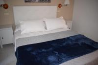 Cama o camas de una habitación en Hostal Alcázar