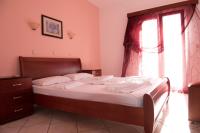 Posteľ alebo postele v izbe v ubytovaní Hotel Anna