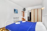 Posteľ alebo postele v izbe v ubytovaní Apartmani Cico