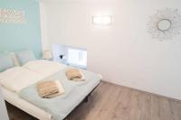 Posteľ alebo postele v izbe v ubytovaní Great Trees Apartment