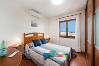 A bed or beds in a room at Villa Julianne 1