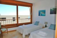 A bed or beds in a room at Lomas de los Monteros - Apartment with seaviews