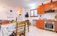 Kuchyň nebo kuchyňský kout v ubytování Apartments Biserka 1495