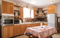 Kuchyň nebo kuchyňský kout v ubytování Apartments Biserka 1495