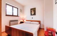 Postel nebo postele na pokoji v ubytování Apartments Biserka 1495