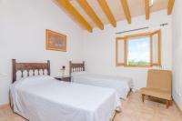 A bed or beds in a room at Sa Mata