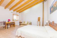 A bed or beds in a room at Sa Mata