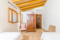 A bed or beds in a room at Sa Mata
