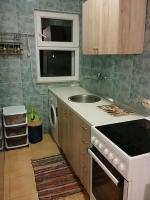 Kuchyňa alebo kuchynka v ubytovaní Gogi apartman