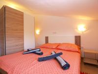Łóżko lub łóżka w pokoju w obiekcie Apartments Biljana 1480