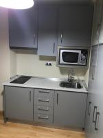 Kuchyňa alebo kuchynka v ubytovaní Apartamentos Centro Malaga