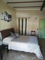 Posteľ alebo postele v izbe v ubytovaní Locanda Montecarlo