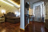 Televízia a/alebo spoločenská miestnosť v ubytovaní Hotel Antica Locanda