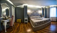Posteľ alebo postele v izbe v ubytovaní Hotel Antica Locanda
