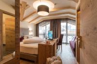 Posteľ alebo postele v izbe v ubytovaní Hotel Bergblick 4 Sterne Superior