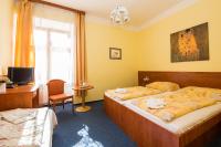 Postel nebo postele na pokoji v ubytování Hotel Morava
