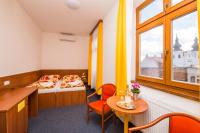 Postel nebo postele na pokoji v ubytování Hotel Morava