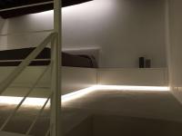 A bed or beds in a room at Solo per Noi Apartment