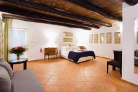 Posteľ alebo postele v izbe v ubytovaní Palazzo Marigliano - Rooms & Suites