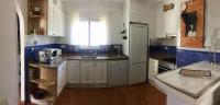 Kuchyň nebo kuchyňský kout v ubytování Villa Montesolana