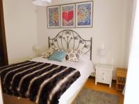 Postel nebo postele na pokoji v ubytování Apartamentos Nazareno