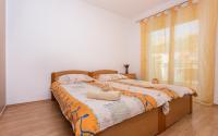 Posteľ alebo postele v izbe v ubytovaní Apartments Kraljić I