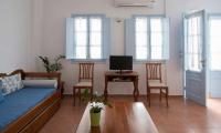 Telewizja i/lub zestaw kina domowego w obiekcie Kastro Suites