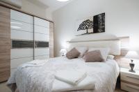 Postel nebo postele na pokoji v ubytování Luxury Apartment Peñuelas Free Parking