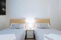 Postel nebo postele na pokoji v ubytování Luxury Apartment Peñuelas Free Parking