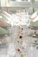 a table with many wine glasses on it at Penzion DaJa in Horní Planá