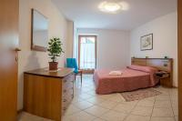 Posteľ alebo postele v izbe v ubytovaní Residence Betulla Molveno