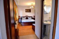Postel nebo postele na pokoji v ubytování Guest House Mavrudieva