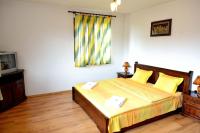 Postel nebo postele na pokoji v ubytování Guest House Mavrudieva