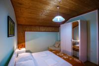 Postel nebo postele na pokoji v ubytování Apartments Slavko